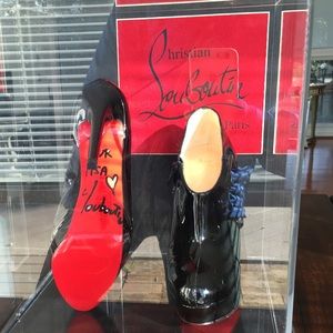 Signed and never worn Christian Louboutin booties!